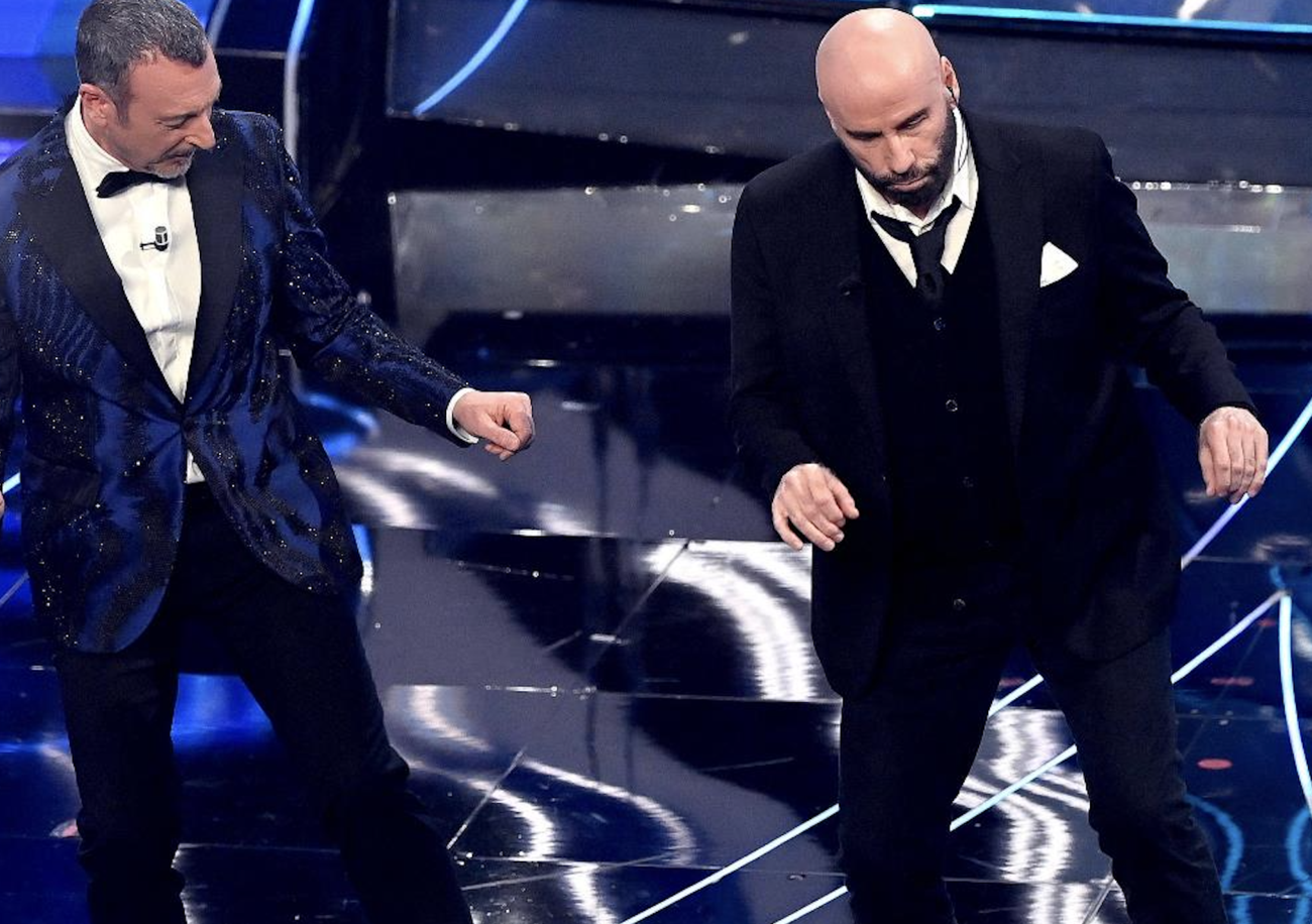 &ldquo;L&rsquo;errore di Amadeus? John Travolta con il ballo del qua qua (cancellato da Raiplay). Il suo cachet possono donarlo a Gaza&rdquo;. Parla il digital strategist Pirrone, che sul presunto successo del Festival dice: &ldquo;Lo share aumenta, ma il numero di spettatori?&rdquo;