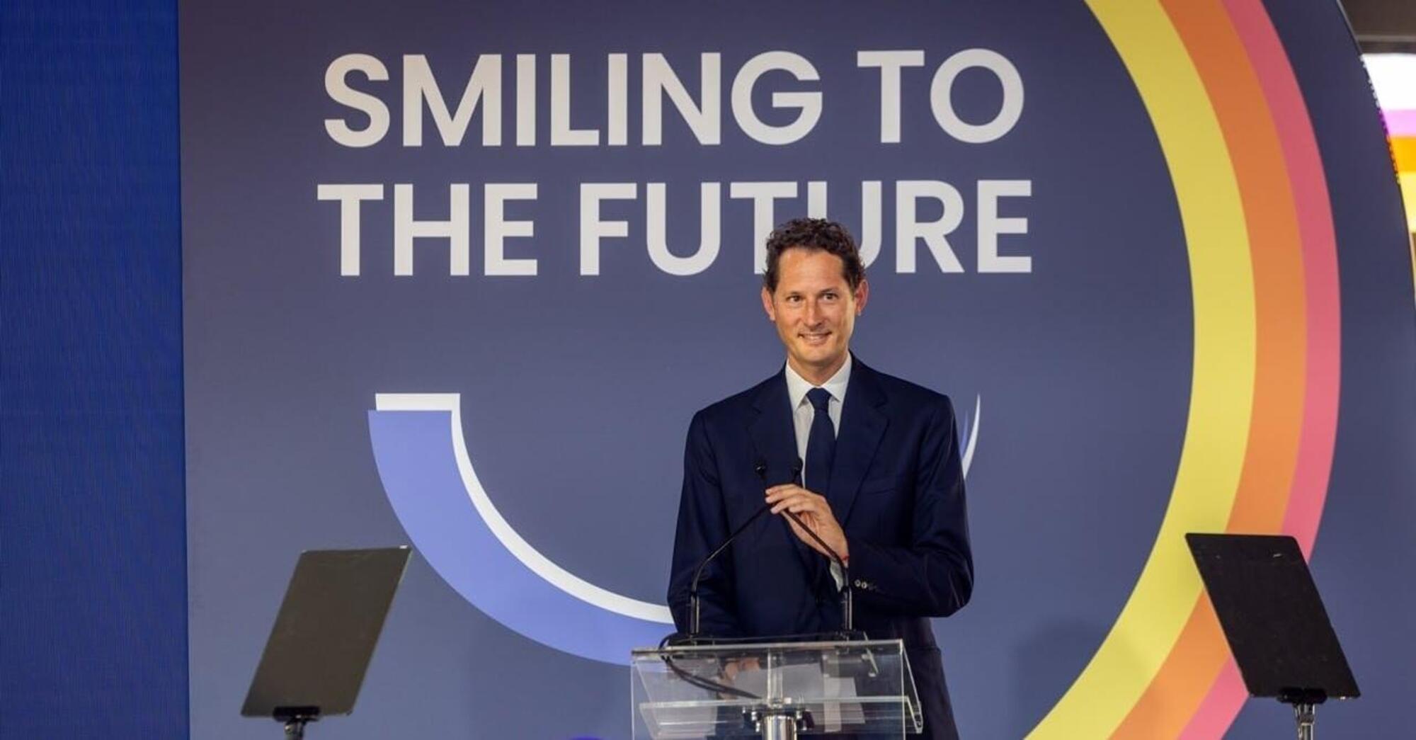 john elkann smiling