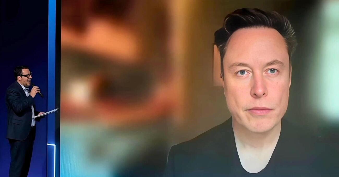 Salvini chiede cose a Musk (che sembra una IA): il glitch tra populismo analogico e avatar digitale. Ecco tutta l&rsquo;intervista (?) e cosa si sono detti (e il lost in translation finale) al congresso della Lega. Ma si saranno capiti?
