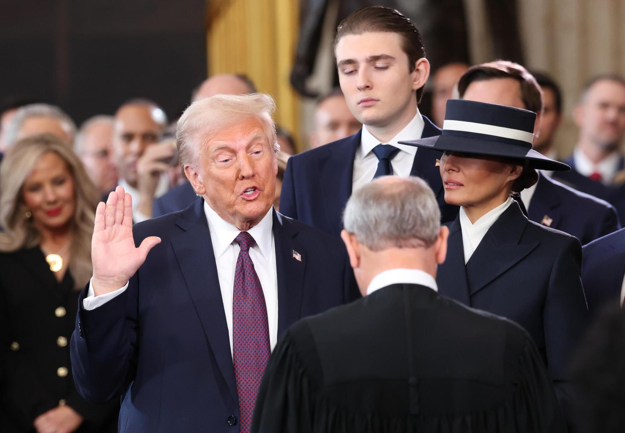 Barron insieme a Donald e Melania Trump