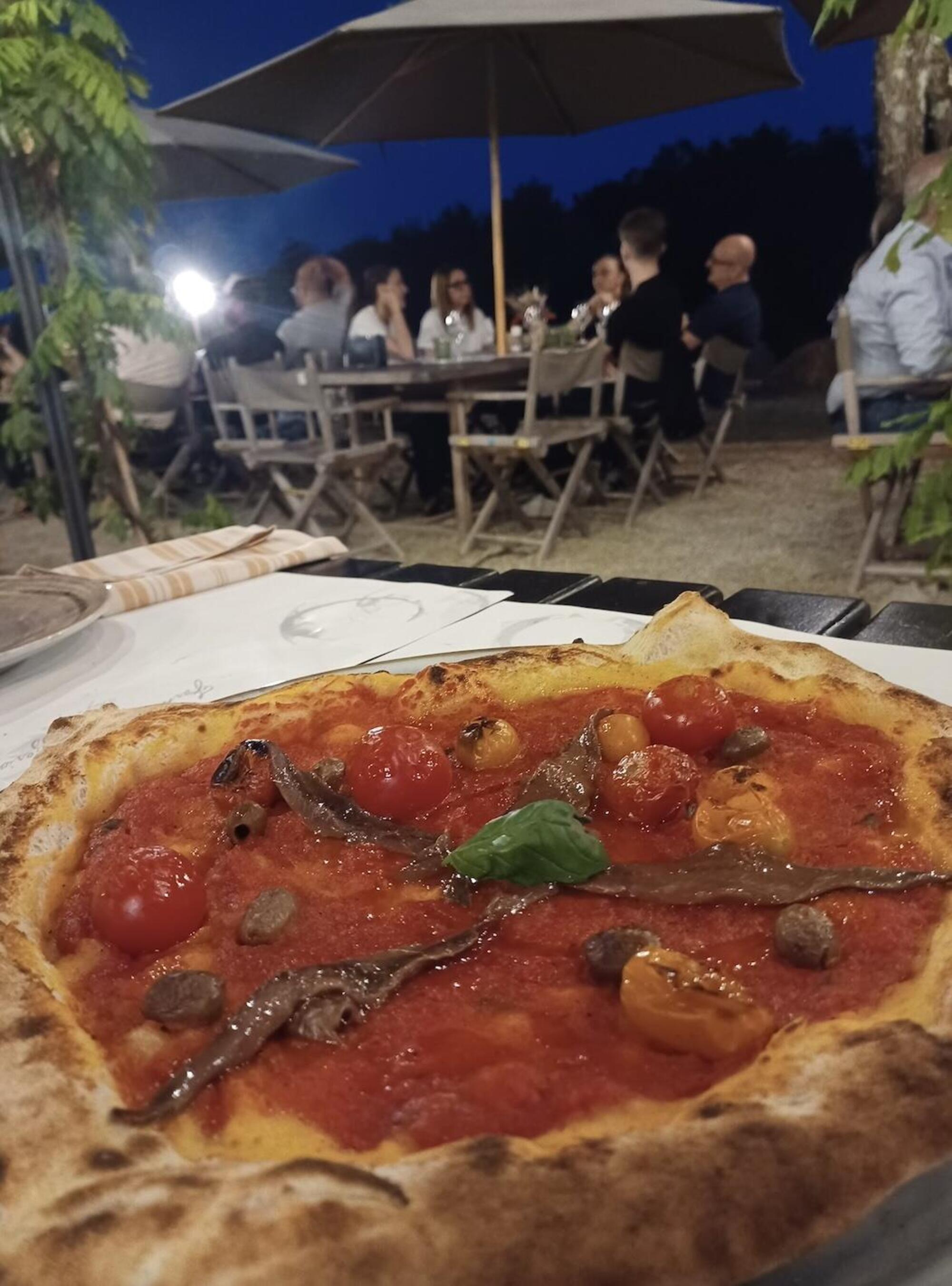 La pizza al ristorante di Sting