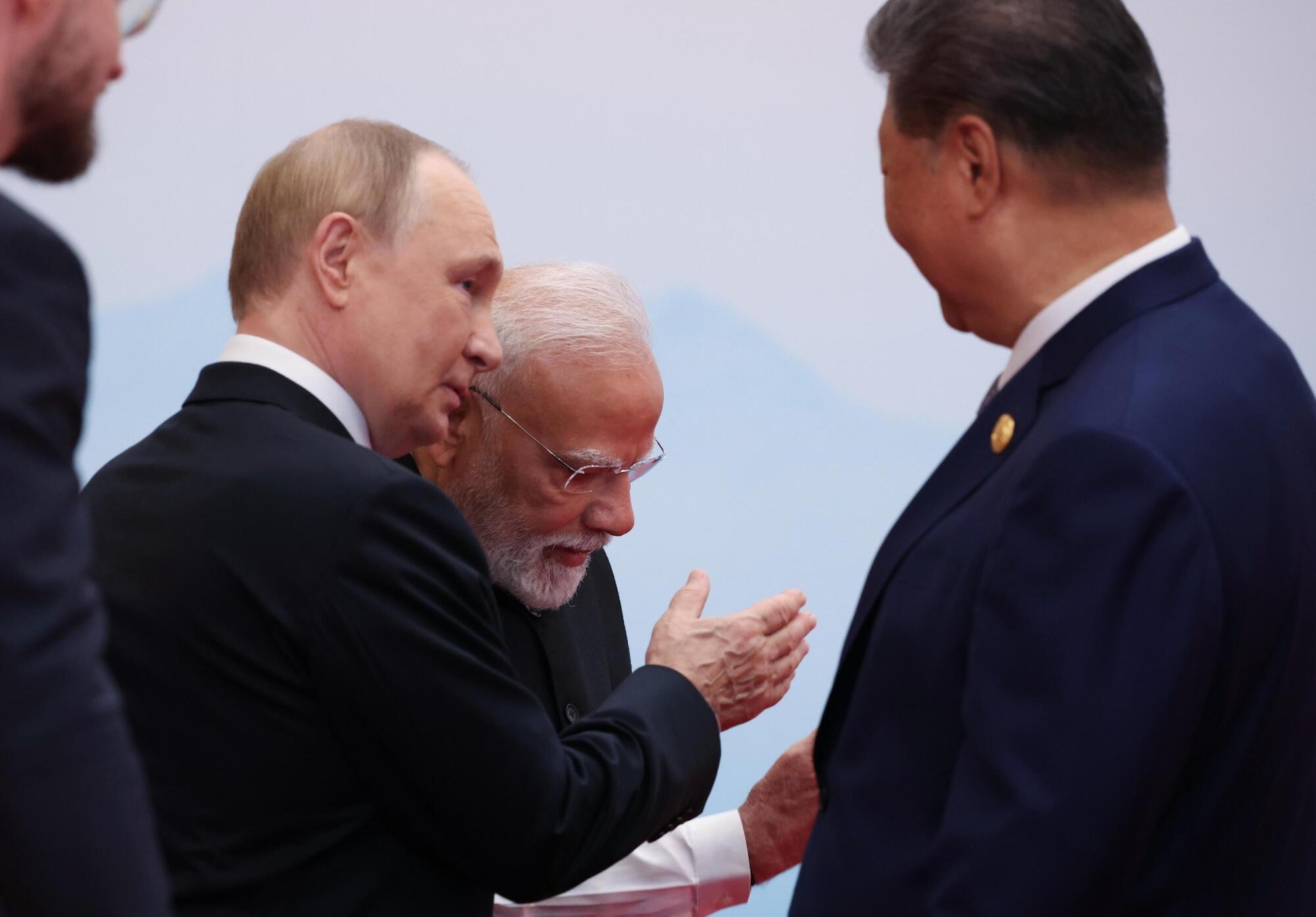 Xi Jinping, Vladimir Putin e Narendra Modi