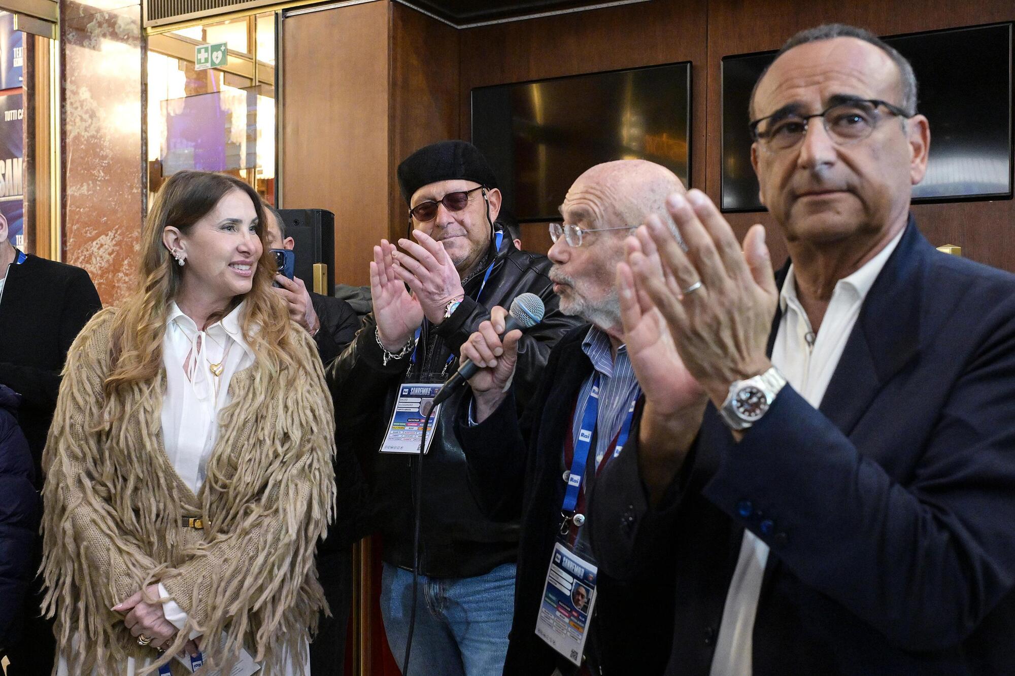 Carlo Conti e i figli di Pippo Baudo all'inaugurazione